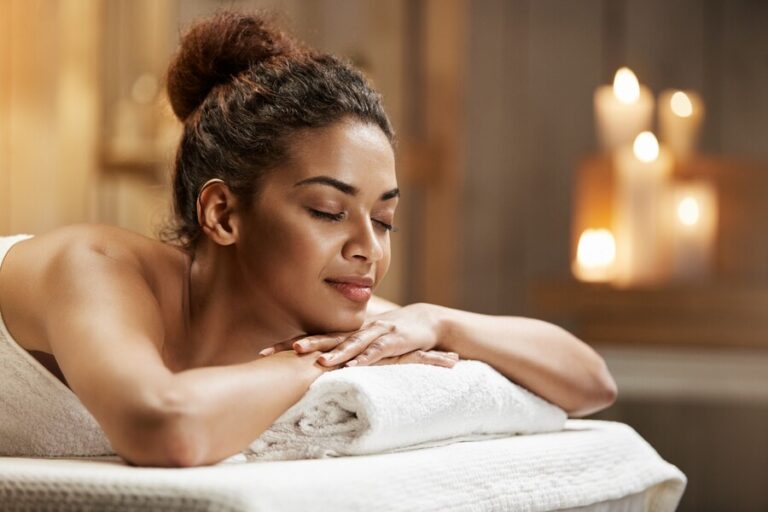 beautiful-african-woman-resting-relaxing-spa-resort-with-closed-eyes_176420-13950